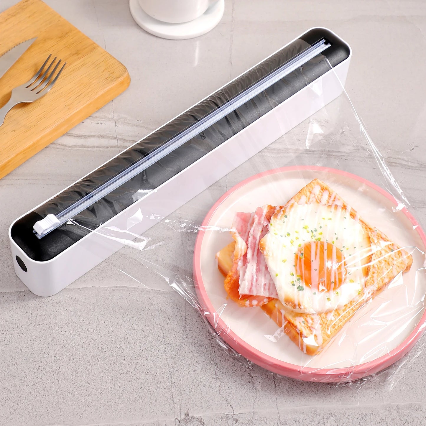 Multi-functional cling film cutter, tear-free sliding suitable for plastic and aluminum foil.